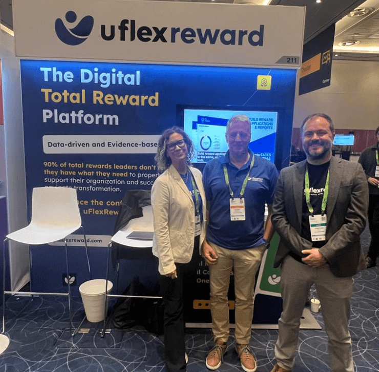 uFlexReward team members standing in front of uFlexReward booth